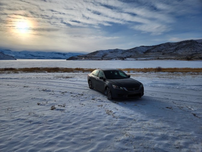 2014 Honda Accord, parked on snowy field.
