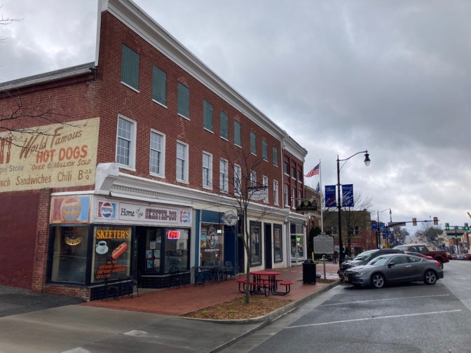 2012 Honda Accord coupe parked in street in front of Skeeter's Hot Dogs.