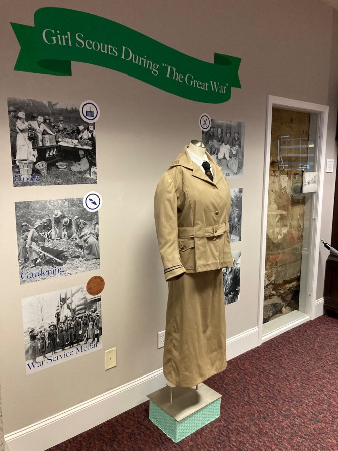 Edith Wilson's Girl Scout uniform on display, with photos.