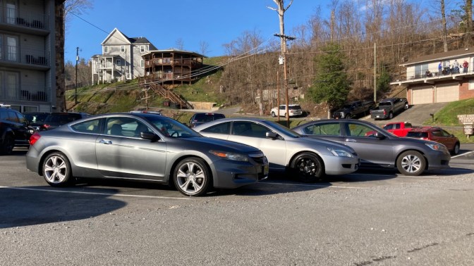 Lineup of 2012 Honda Accord coupe, 2003 Honda Accord coupe, and 2014 Honda Accord sedan.