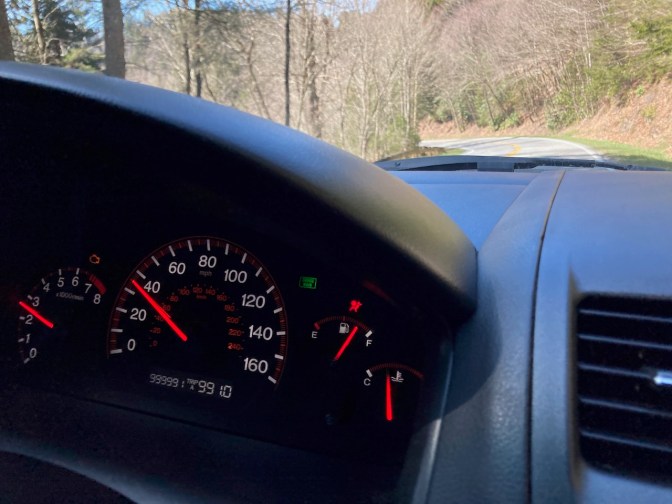 View of mountain road from inside of 2003 Honda Accord.