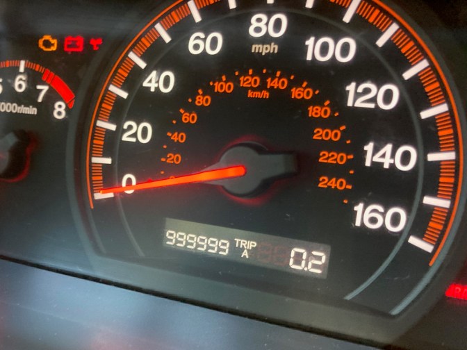 Car odometer reading 999999 TRIP A 0.2 miles