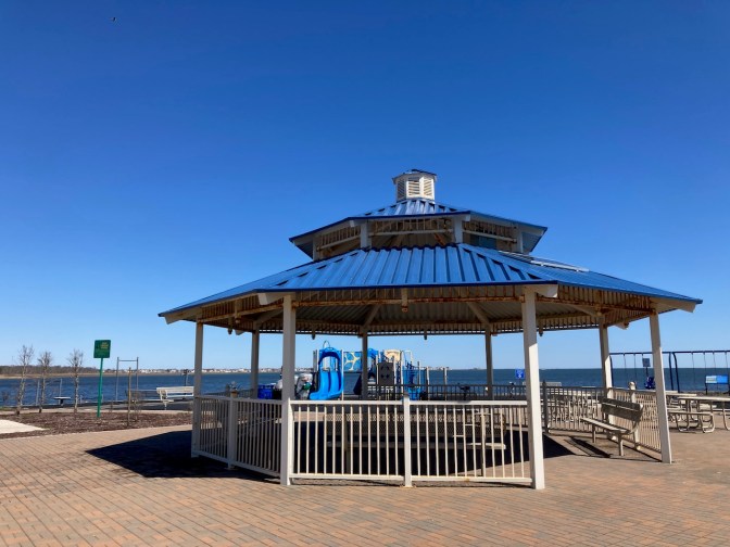 Gazebo in foreground, with bay in background.