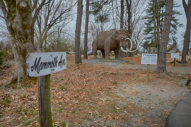 Sign that says Mammoth Ave, with Wooly Mammoth in background.