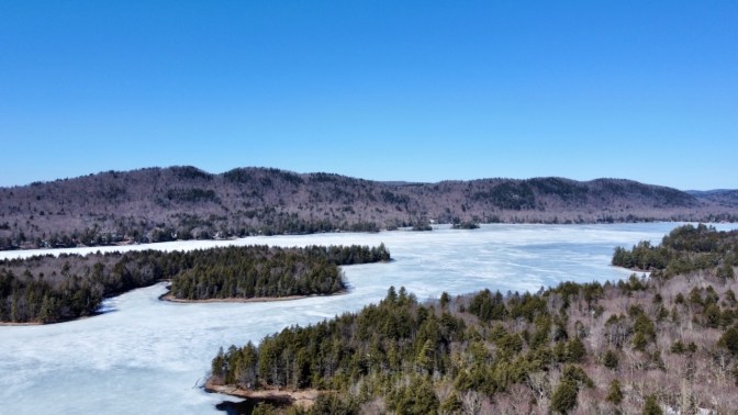 View of Fourth Lake, covered in ice.