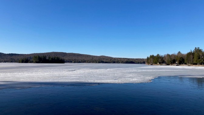 Panorama of Fourth Lake, covered in ice.