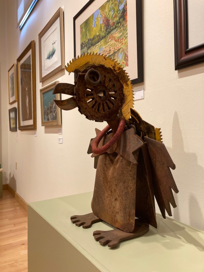 Sculpture of hawk made from scrap metal.