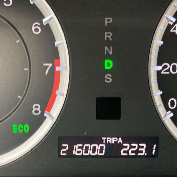 Car odometer reading 216000 TRIP A 223.1