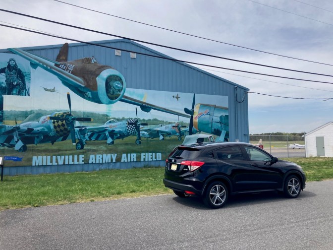 2021 Honda HR-V parked in front of building. Building has mural on side of P-47 fighter planes.