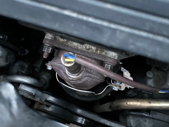 View of catalytic converter and heat shield.
