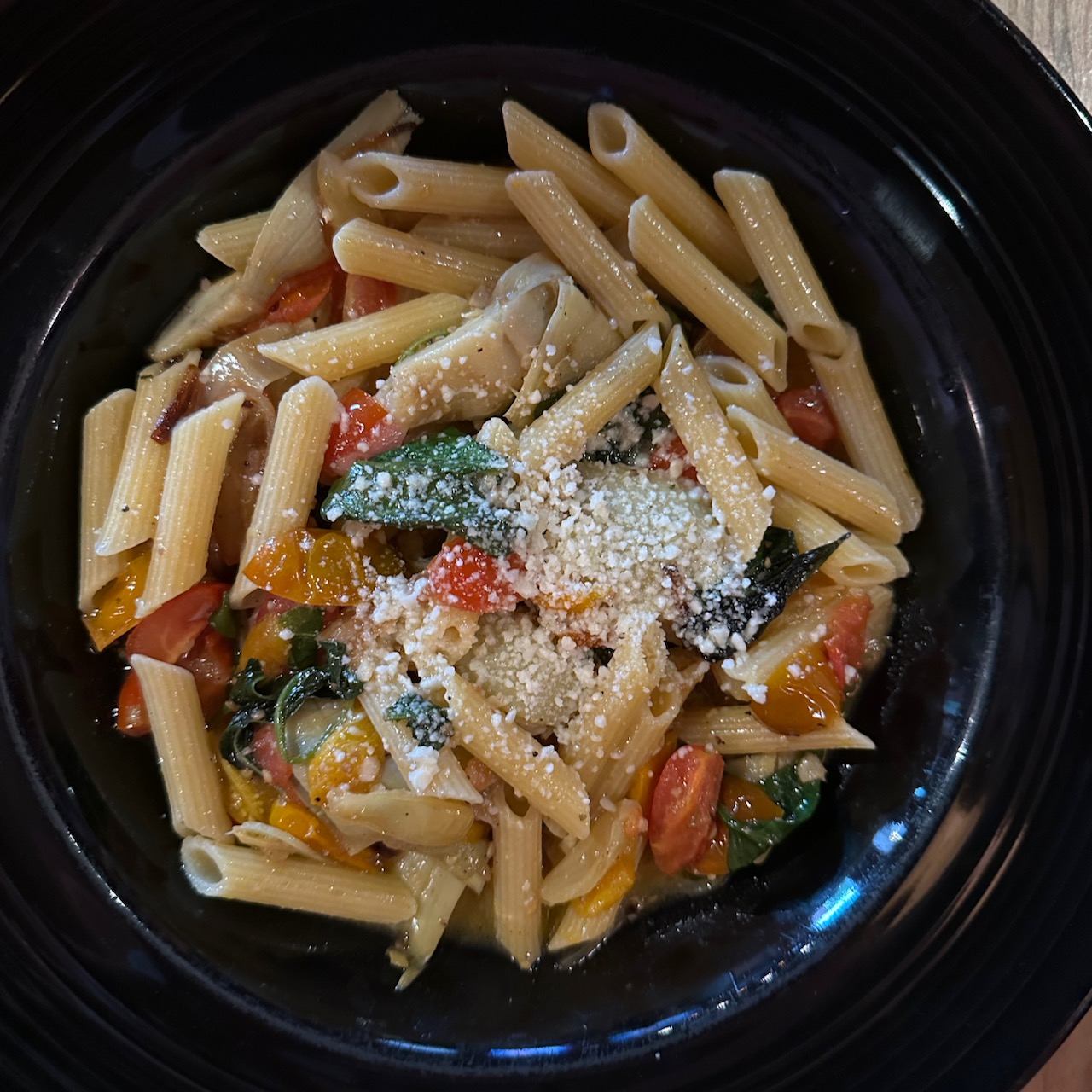 Plate of pasta with vegetables.