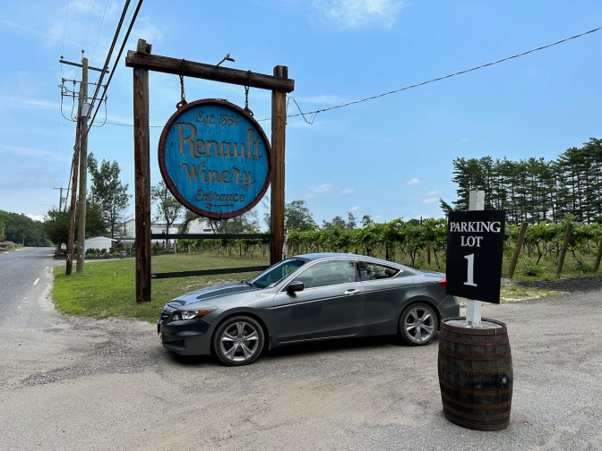 2012 Honda Accord coupe parked in front of Renault Winery entrance sign.