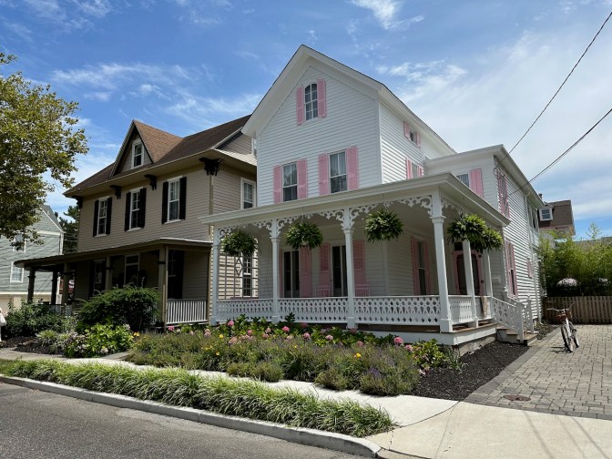 Victorian houses on road.