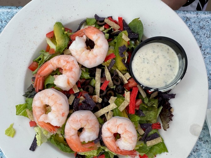 Shrimp taco salad on plate.