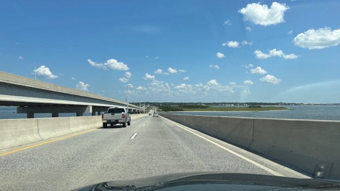 View of Garden State Parkway bridge, with bay water on right side of bridge.