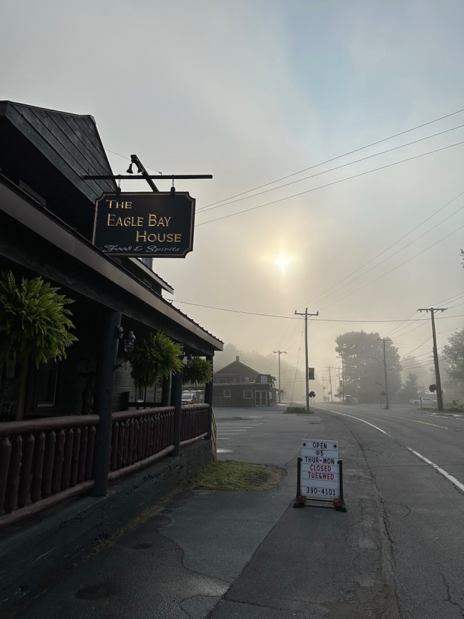 Exterior of The Eagle Bay House at sunrise.