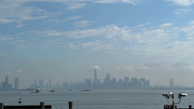 New York City skyline from harbor on Staten Island.