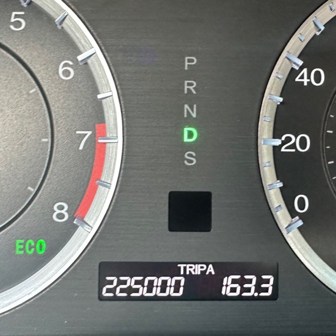 Car odometer reading 225000 TRIP A 163.3
