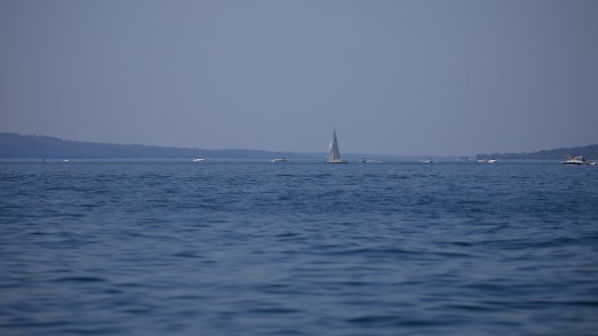 View of boats and ships on lake.