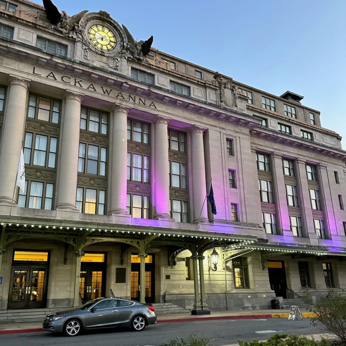 Exterior of Lackawanna Station Hotel, with 2012 Honda Accord coupe parked in front of it.