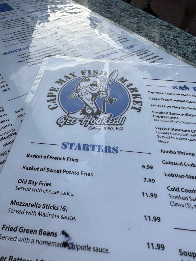 Menu of Cape May Fish Market on table.