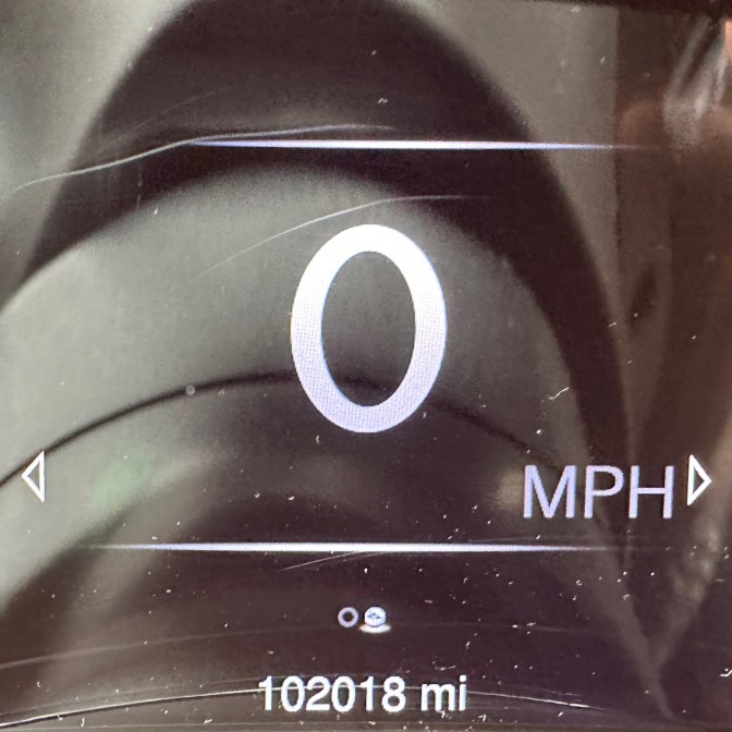 Car odometer reading 102018 miles