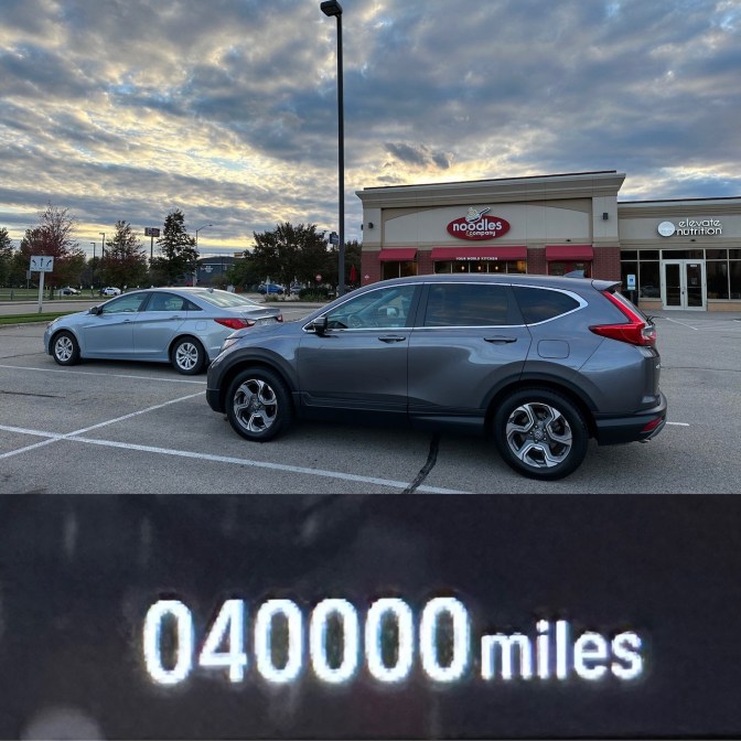 2019 Honda CR-V on top half of image, and odometer reading 40,000 miles on lower half of image.