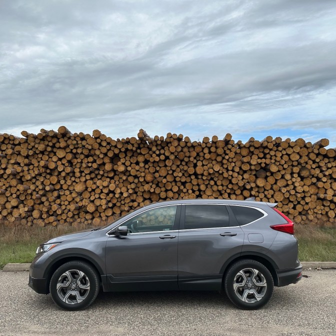 2019 Honda HR-V parked in front of lumber.