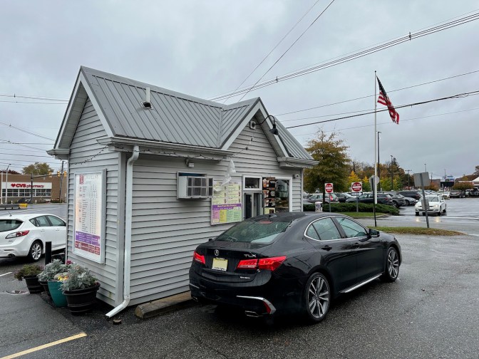 2020 Acura TLX parked beside Longfellow Coffee.
