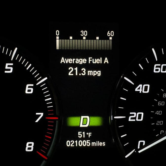 Car odometer reading 22005 miles.