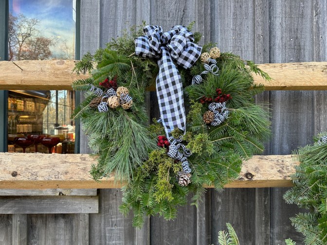 Christmas wreath on exterior of building.