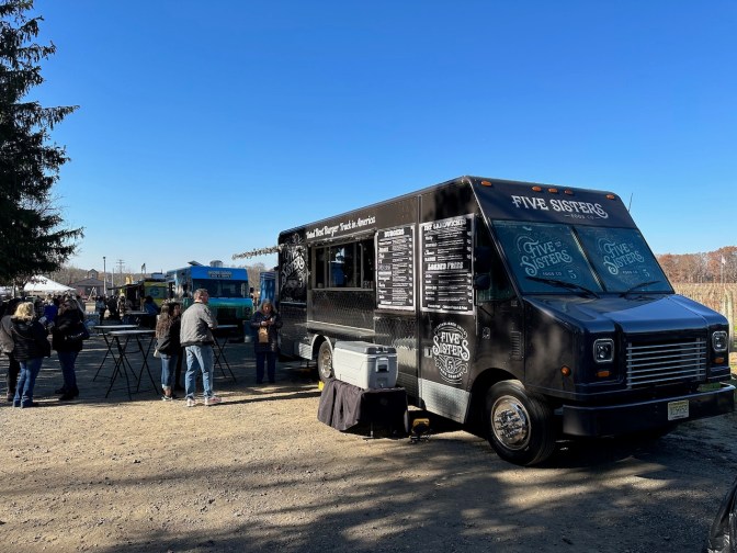 Food trucks parked at winery.