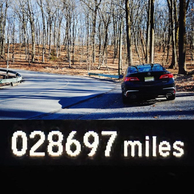 Split image: top half - 2020 Acura TLX on side of tree-lined road. Bottom half is odometer shot reading 28697 miles.