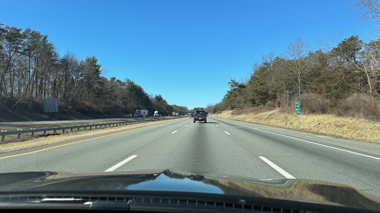 View of I-78 from behind dashboard of Acura TLX.