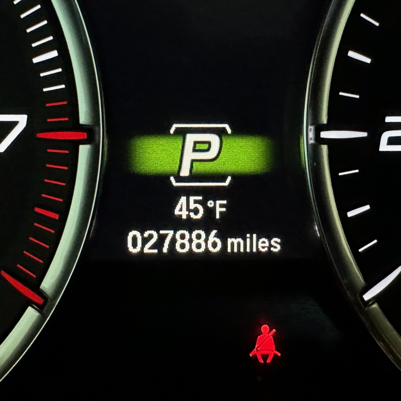 Car odometer reading 27886 miles.