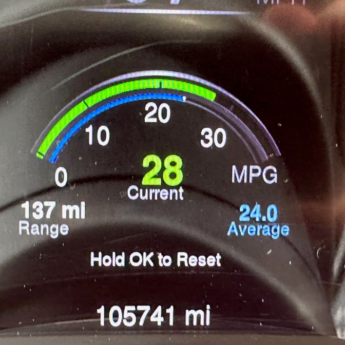 Car odometer reading 105741 miles.