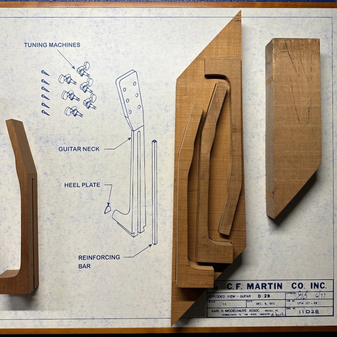 Display of different aspects of guitar neck construction.