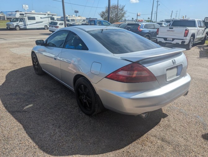 2003 Honda Accord coupe in parking lot.