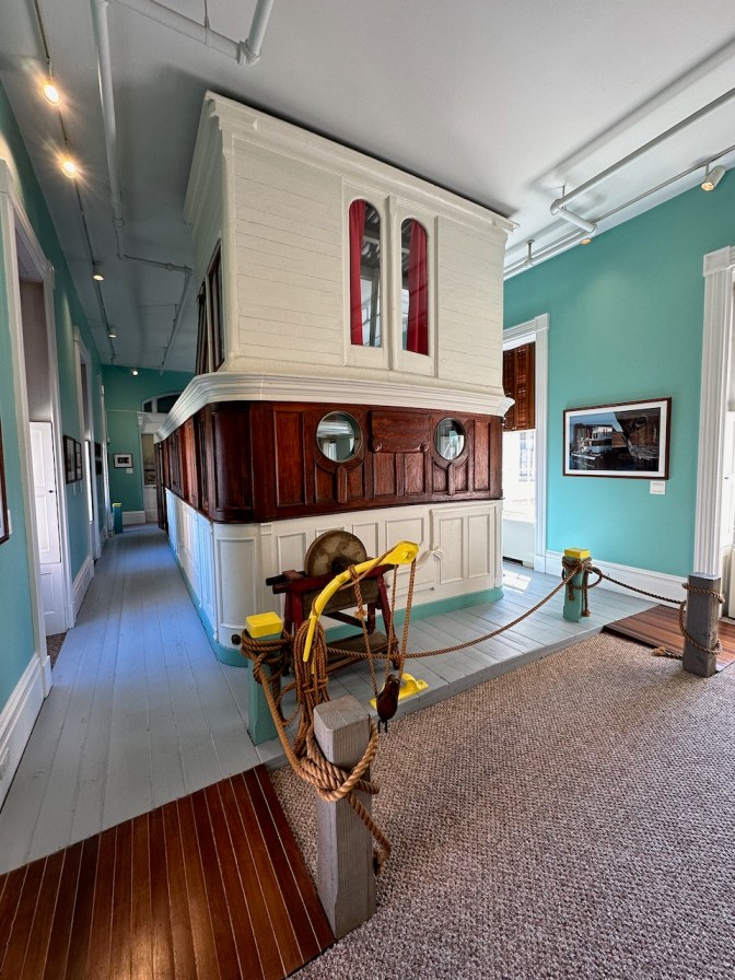 Superstructure of house boat, placed within museum.