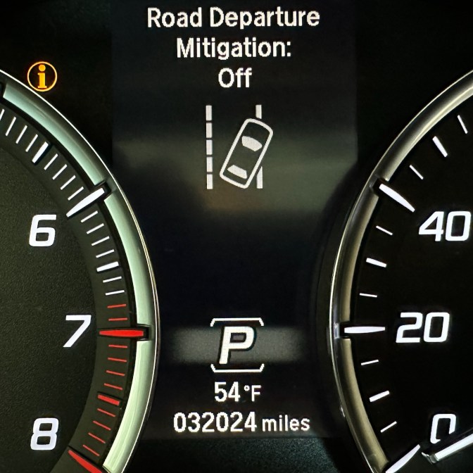 Car odometer reading 32024 miles.