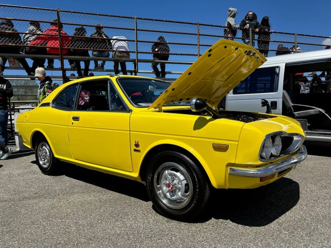 Yellow Honda 1300 Coupe in. yellow.