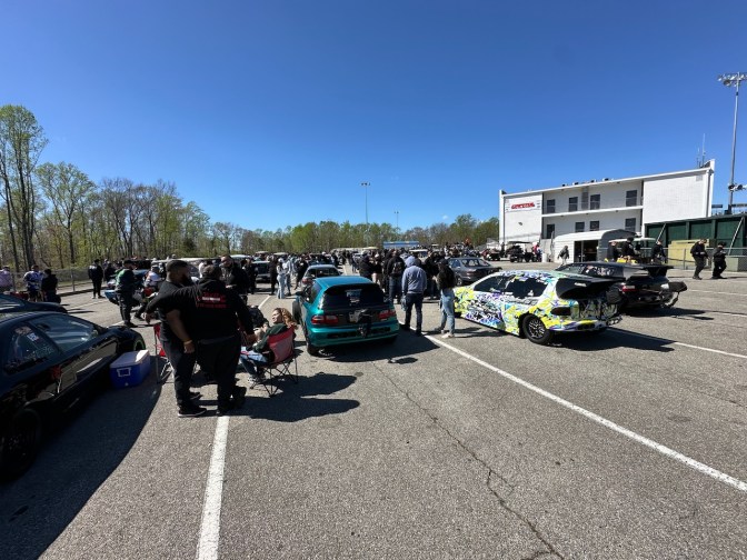 Cars in staging lanes of track.