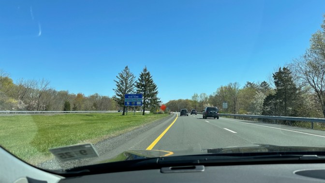 View of I-87 with sign for New York.
