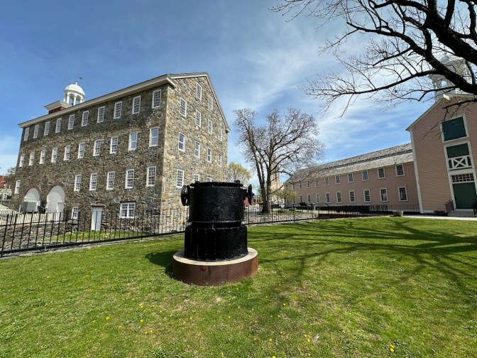 View of mill and machine buildings at Slater Mill.