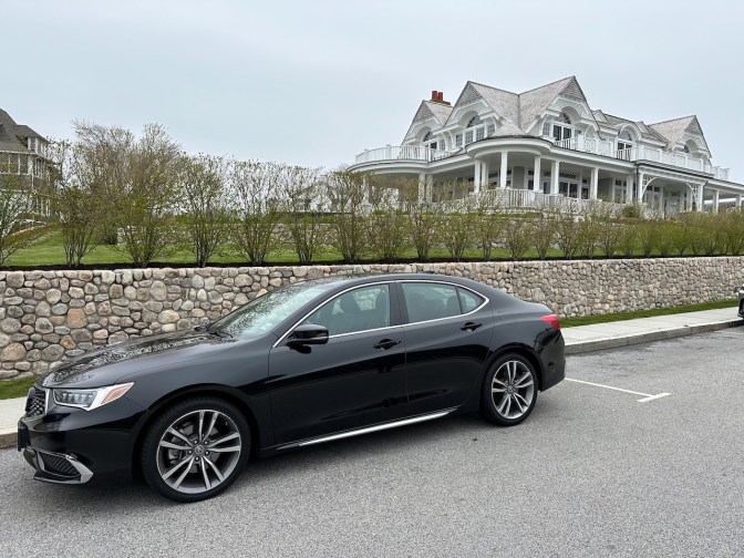 2020 Acura TLX parked in front of mansion.
