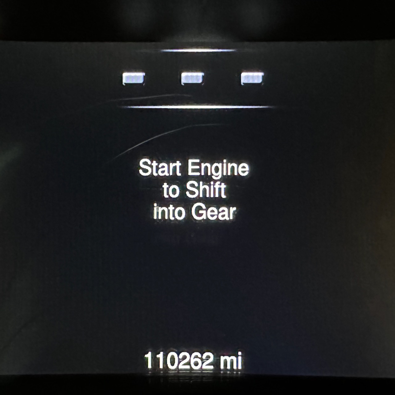 Car odometer reading 110262 miles.