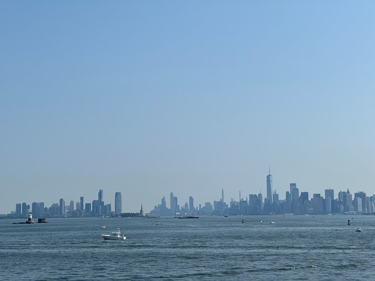 View of Manhattan skyline from across New York Harbor.