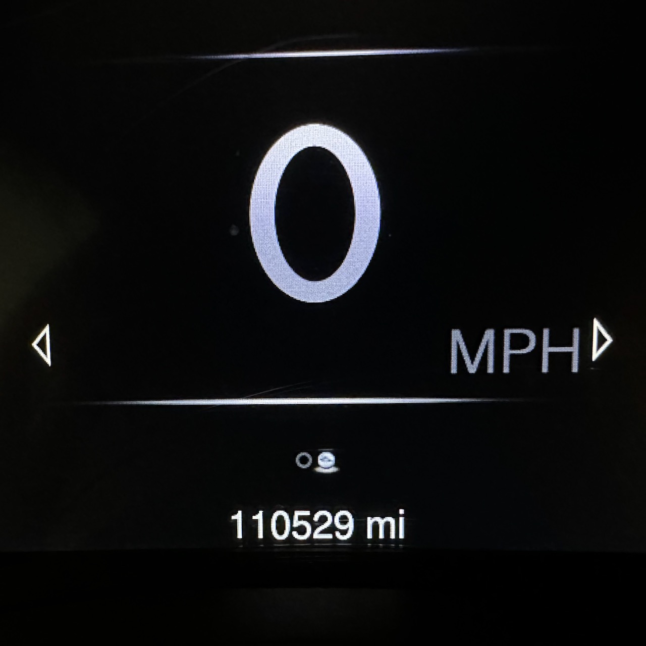 Car odometer reading 110529 miles.