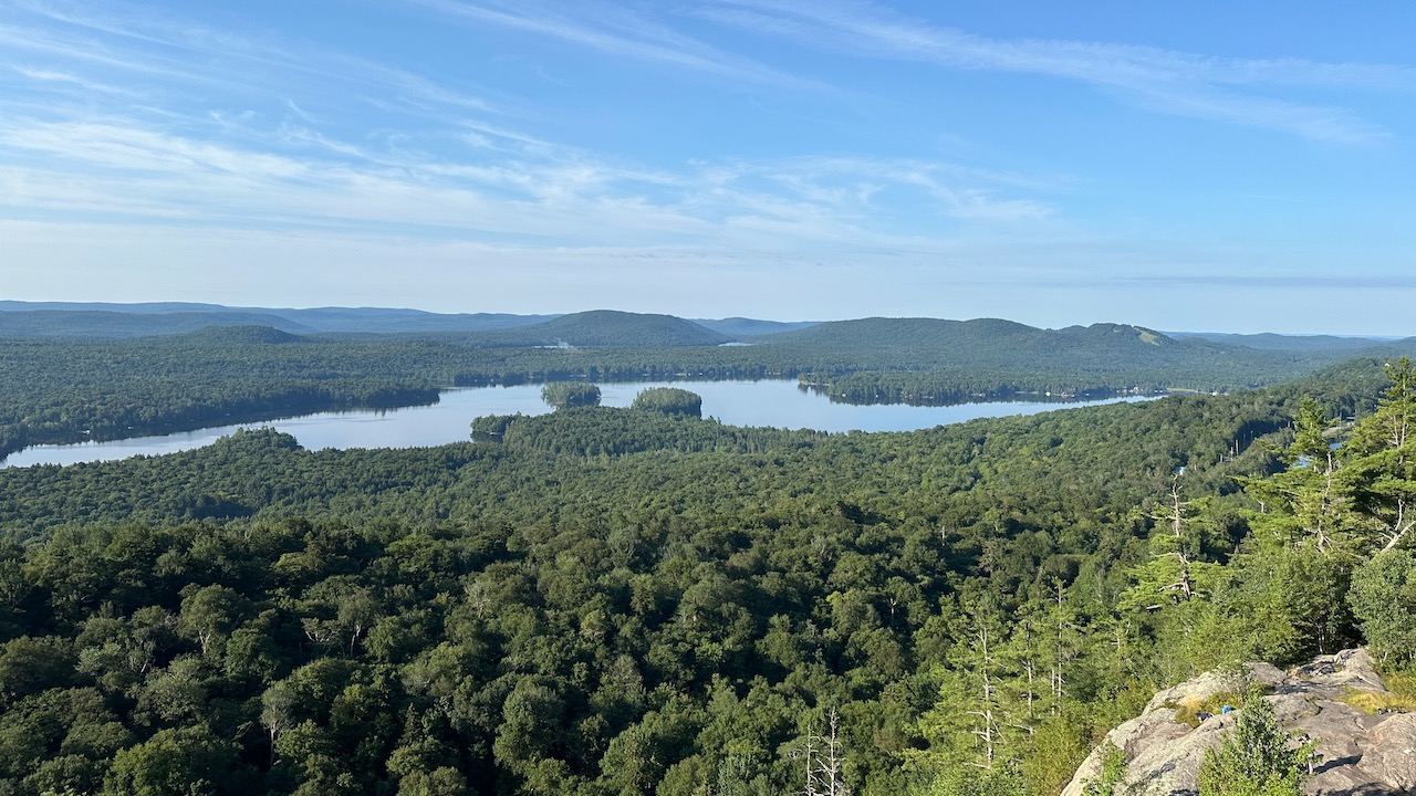 View of surrounding mountains and lakes.
