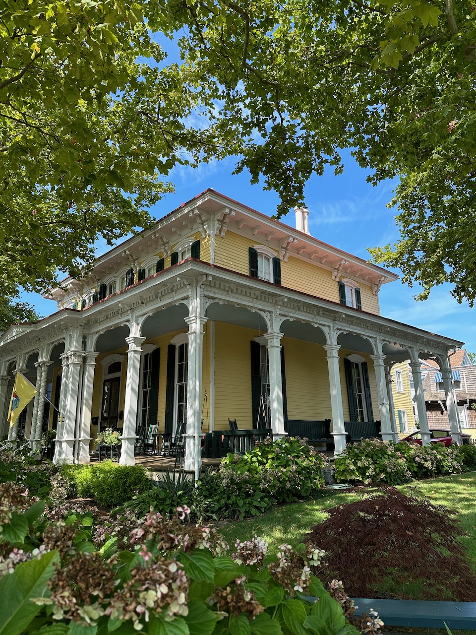 Yellow two-story house.